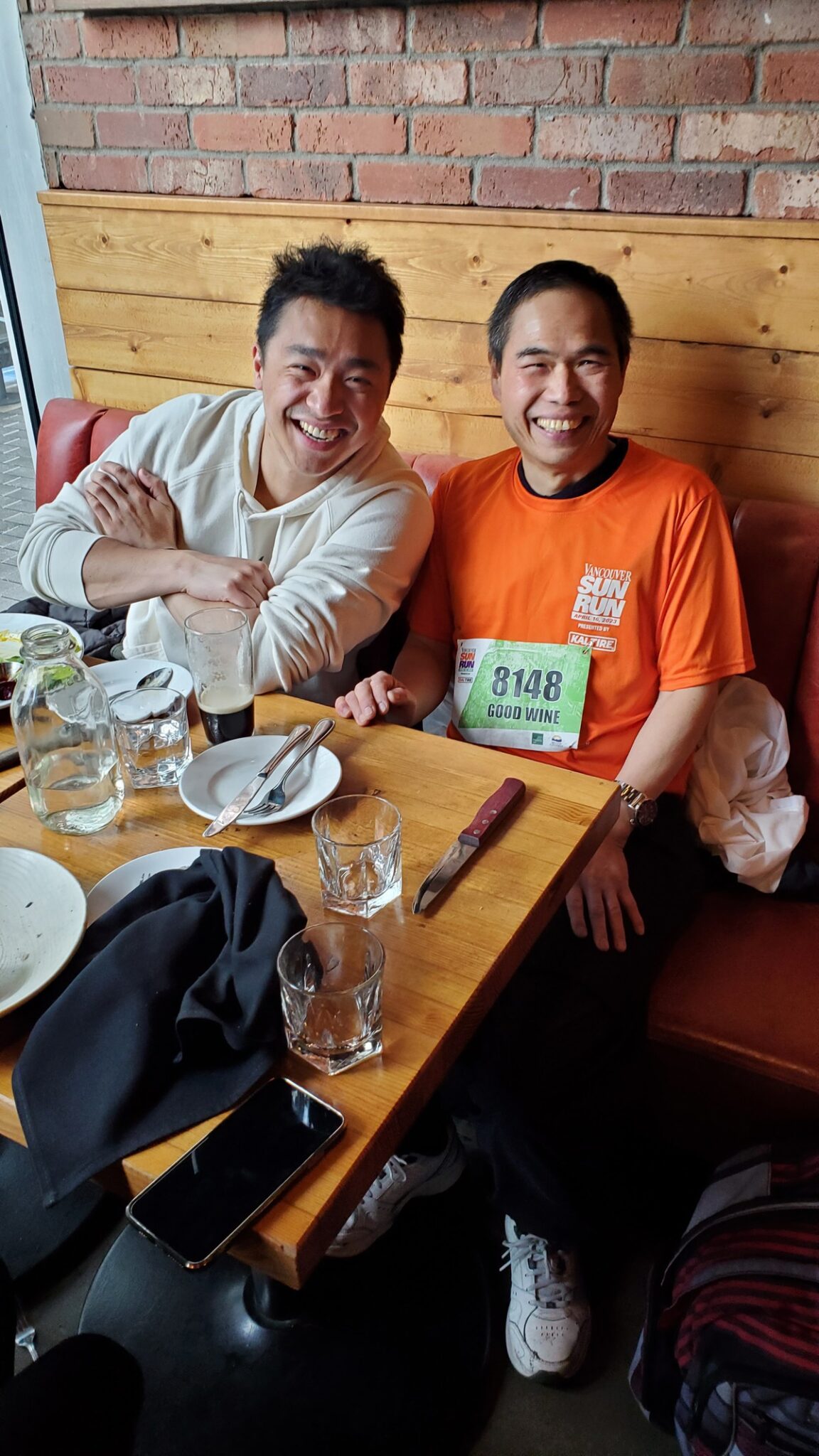 Marathon Participants Enjoying Food and Drinks at Vancouver's The Flying Pig