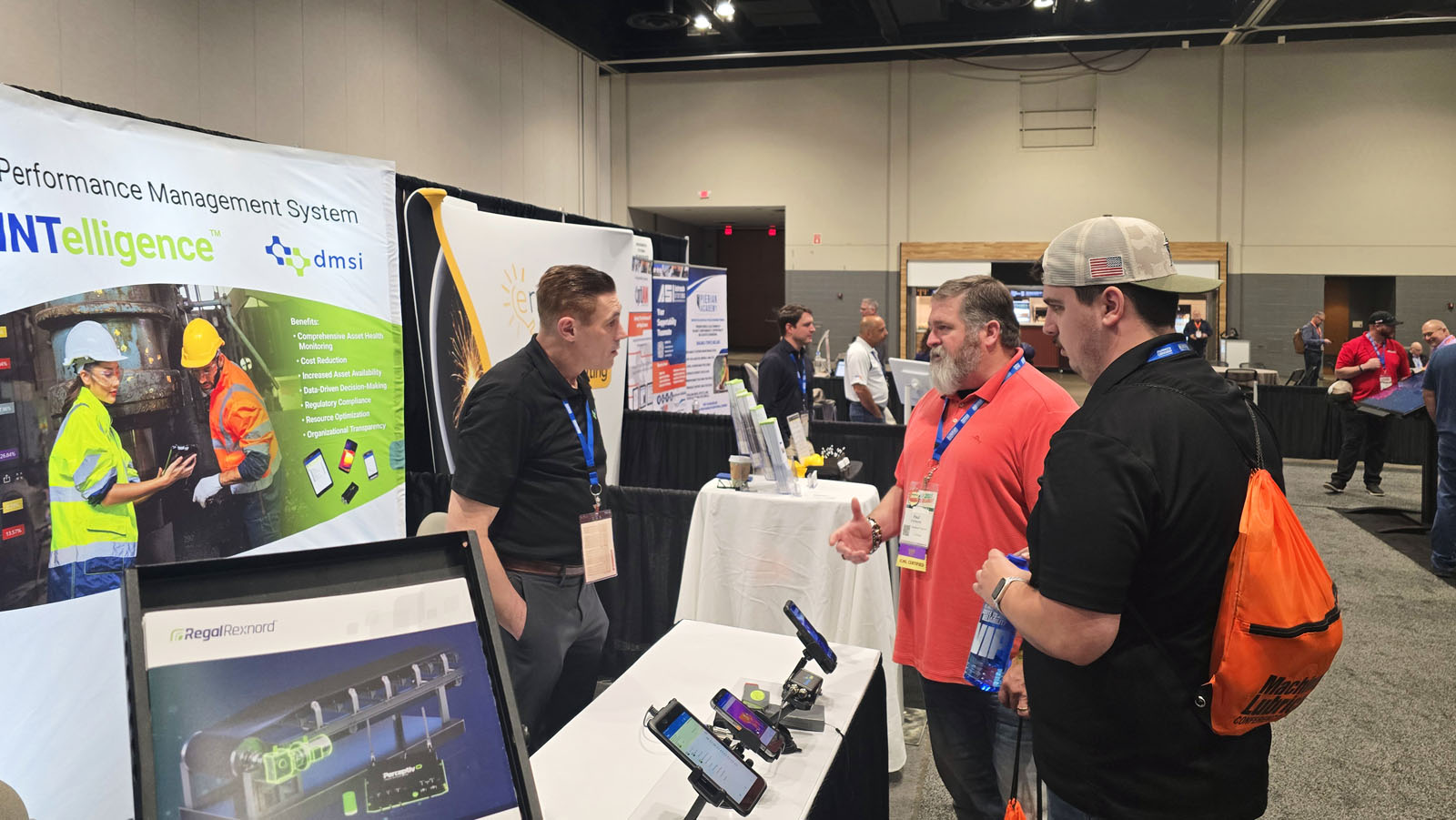 John MacSween talking to John and Paul at our booth during Reliale Plant Conference 2025.