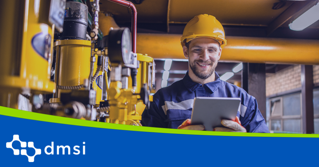 A reliability engineer using a mobile device, looking excited.