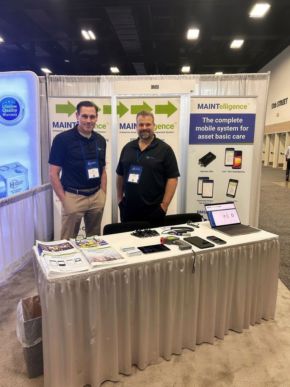 John MacSween and Andrew Liddle at the DMSI booth