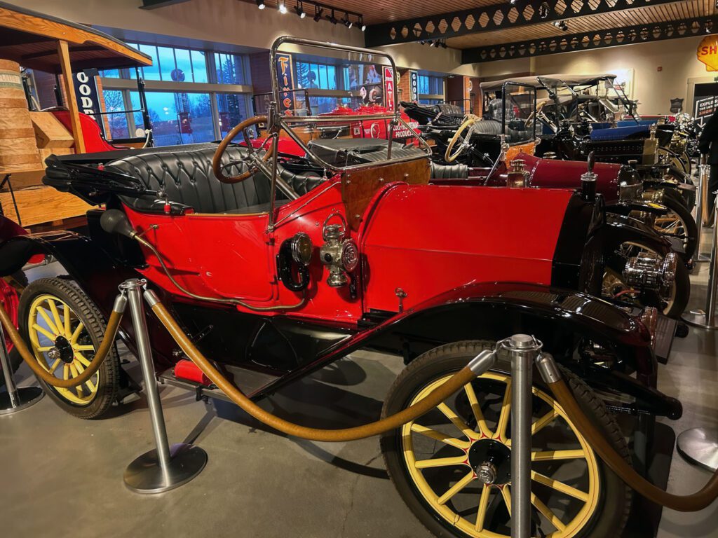 A vintage car being showcased at the conference venue.
