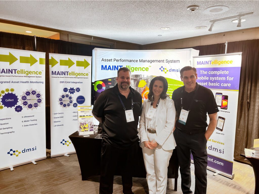 Andrew Liddle and John MacSween with Ghaz Marinho on the DMSI booth. 