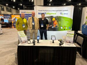John with the T5 Group at SMRP 2026 in Raleigh, with mobile devices and brochures on display